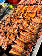 Stack of roasted meat on aus-press