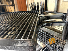 Grill with a grid on a metal stand