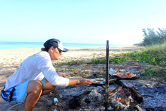  Swinging hot plate and grill combo in outdoor setting