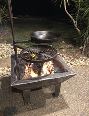 www.aussiecampfirekitchens.com AUSTRALIAN HANDCRAFTED Cooking Gear BACKYARD FIRE PIT with SWINGING GRILL, CRADLE & BBQ PAN.